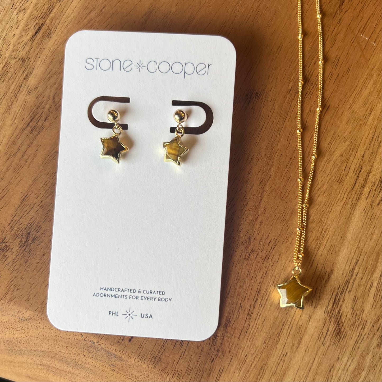 Stone Cooper tigers eye star post earring pair