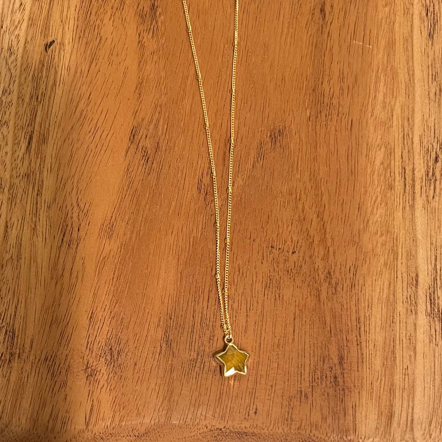 Stone Cooper tiger eye star necklace