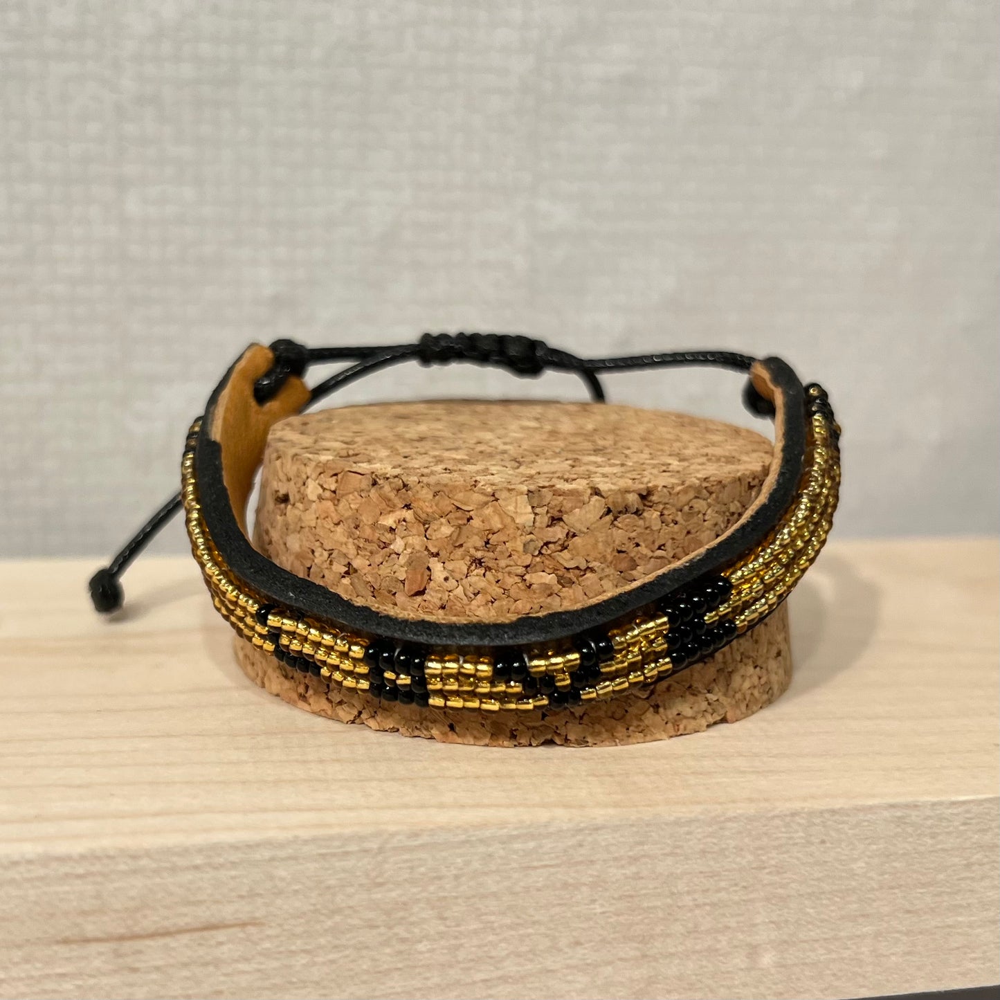 Love is project Gold Black LOVE Bracelet