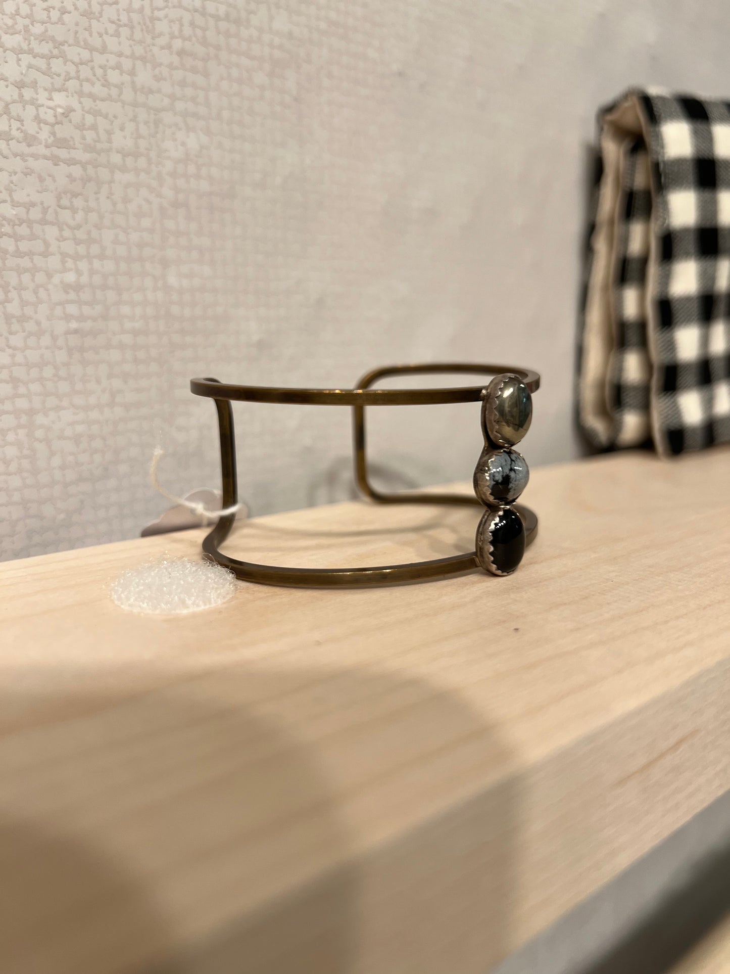 Stone Cooper Wide brass cuff with trio of stones