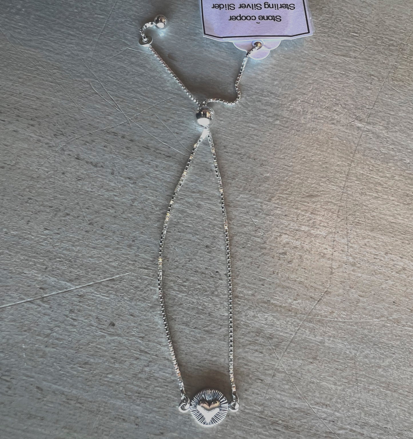 Slider bracelet with radiant heart charm