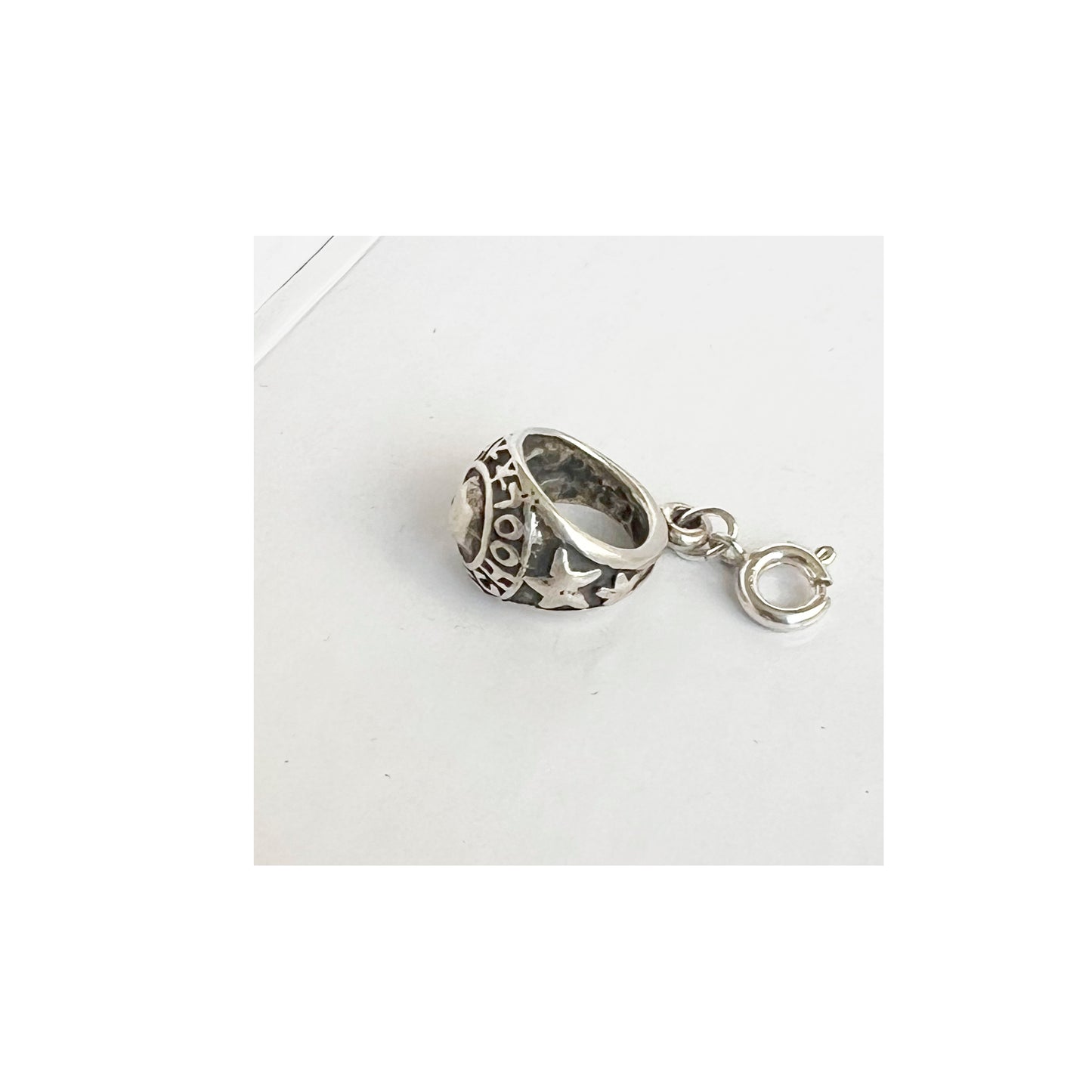 Stone Cooper Class ring charm