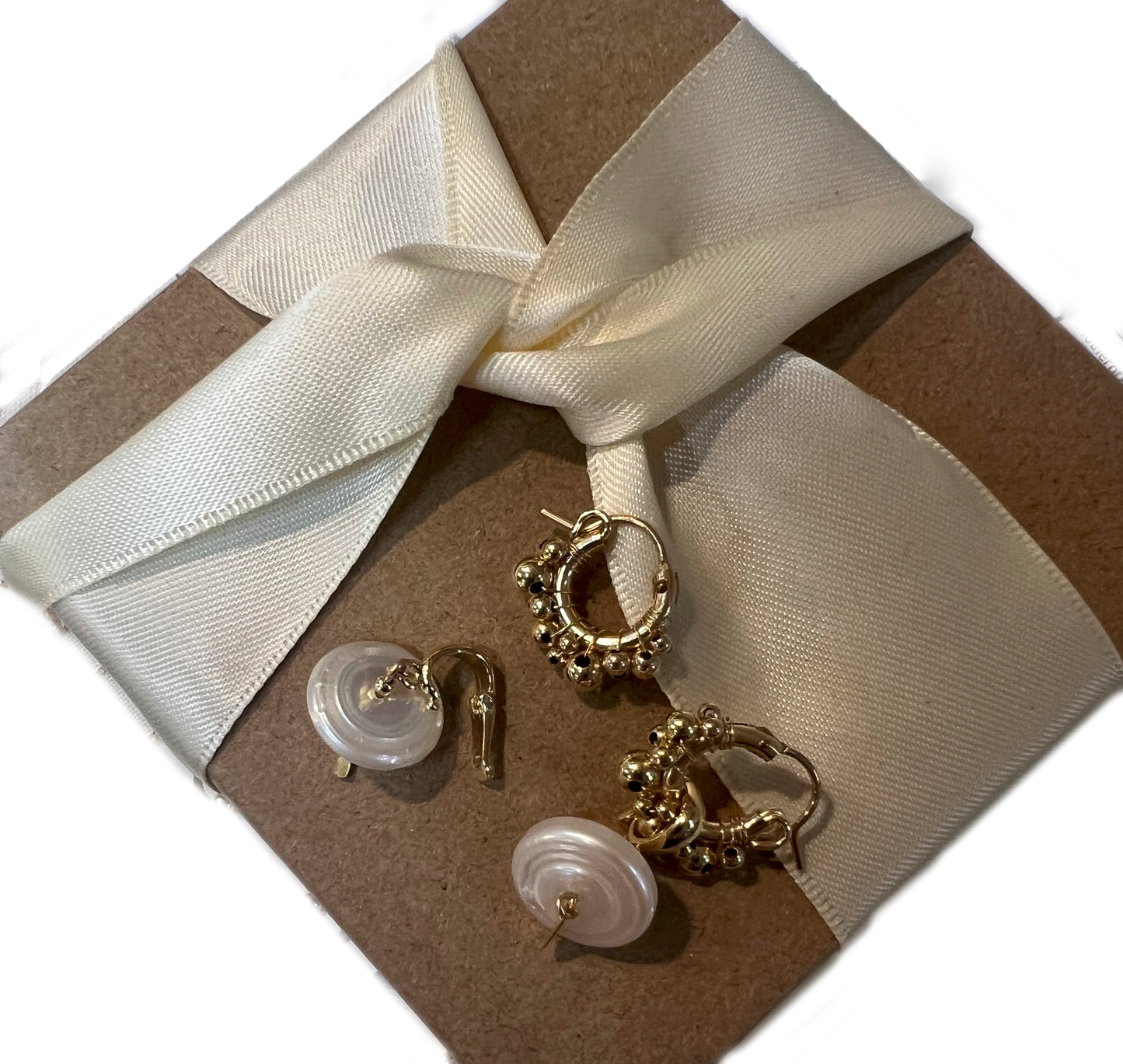 The Swellife Saucer Freshwater Pearl Charm