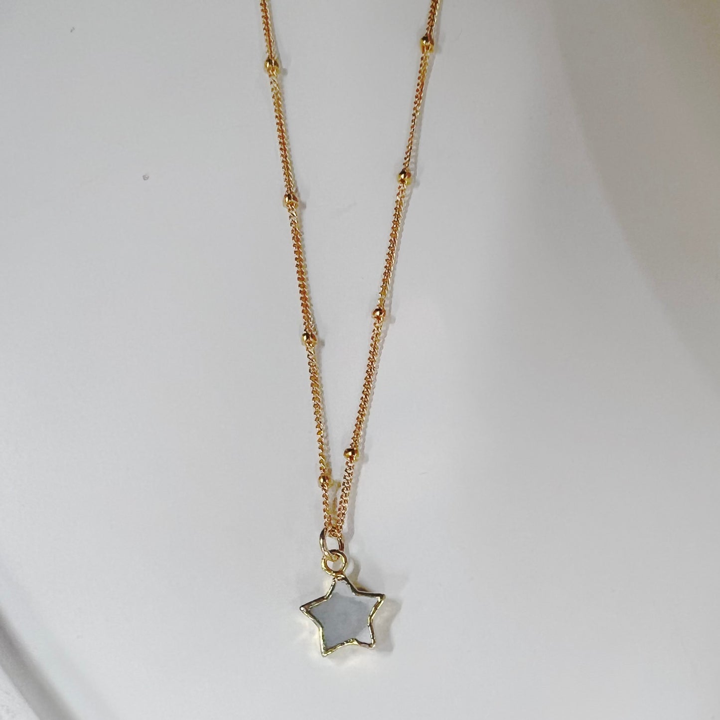 Stone Cooper Mother of Pearl Tiny Star necklace