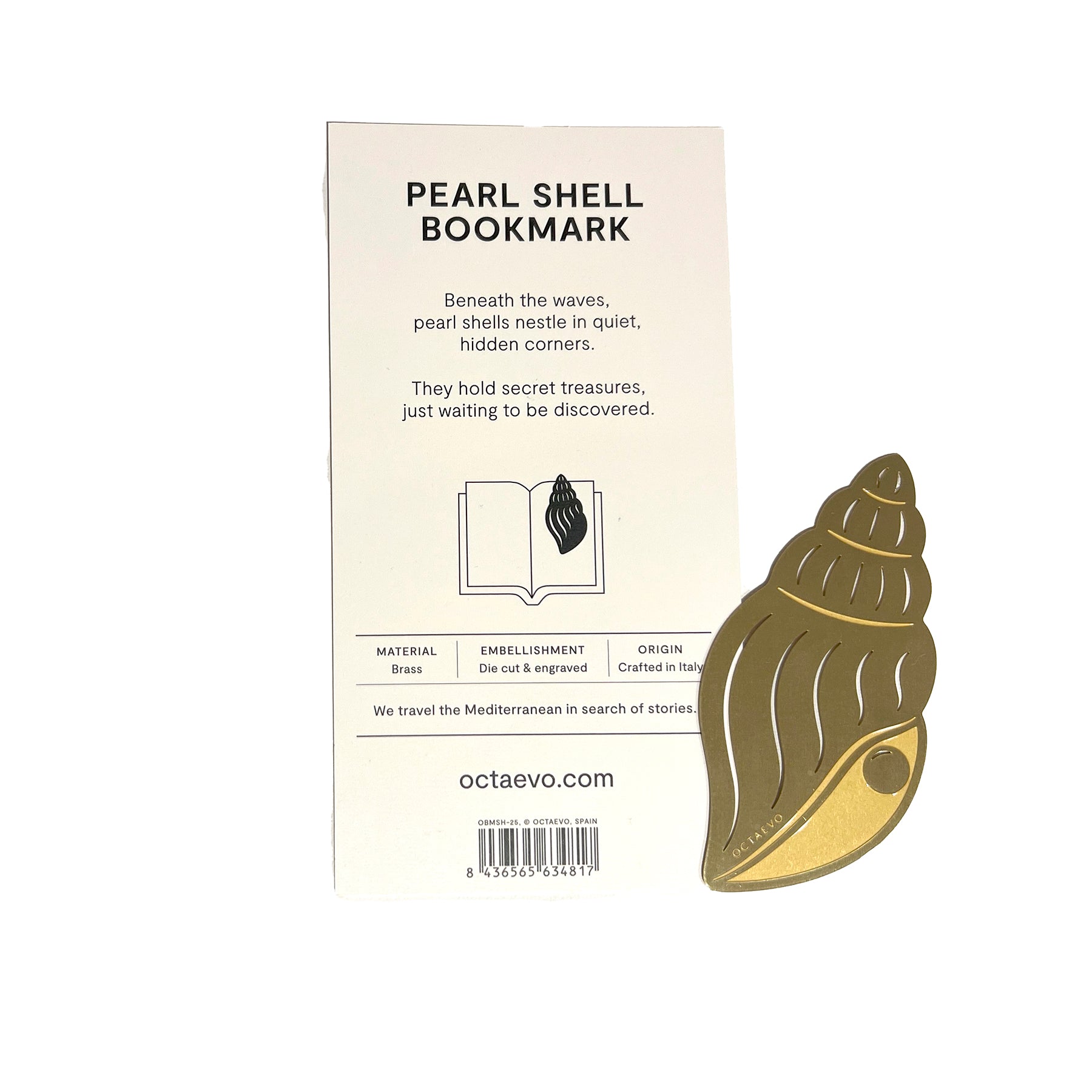 Brass pearl shell bookmark on a beige card with text